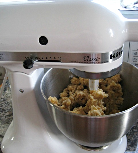 Beat the butter and sugar together Kitchenaid mixer counter white cookie dough mix