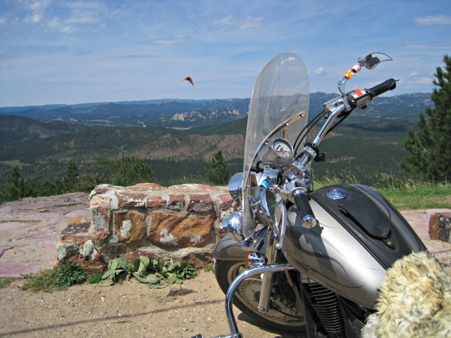 Motorcycle parked in mountains motorcycle biker shadow honda mountain black hills south dakota trip