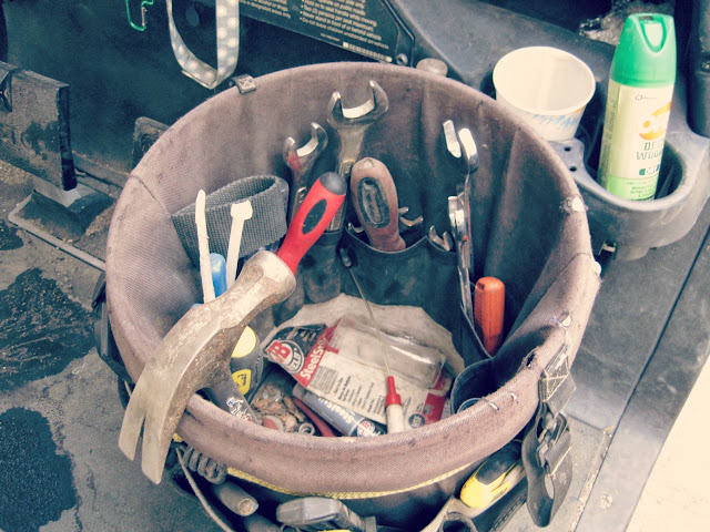 tools in a bucket hammer wrench construction 