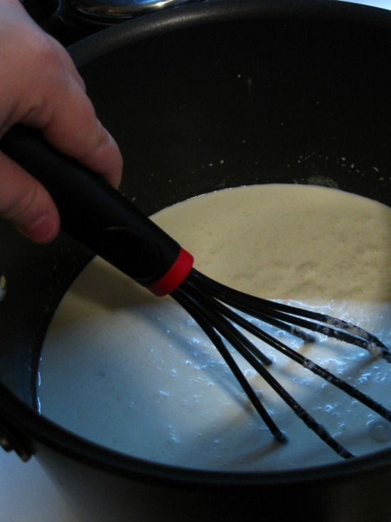 Butternut squash lasagna whisk in milk and cream stir whisk milk and cream saucepan recipe entree butternut squash