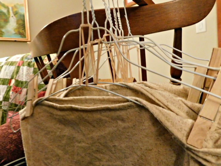 fabric hanging osnaburg fabric hanging on hangers waiting to grad dye woven wrap
